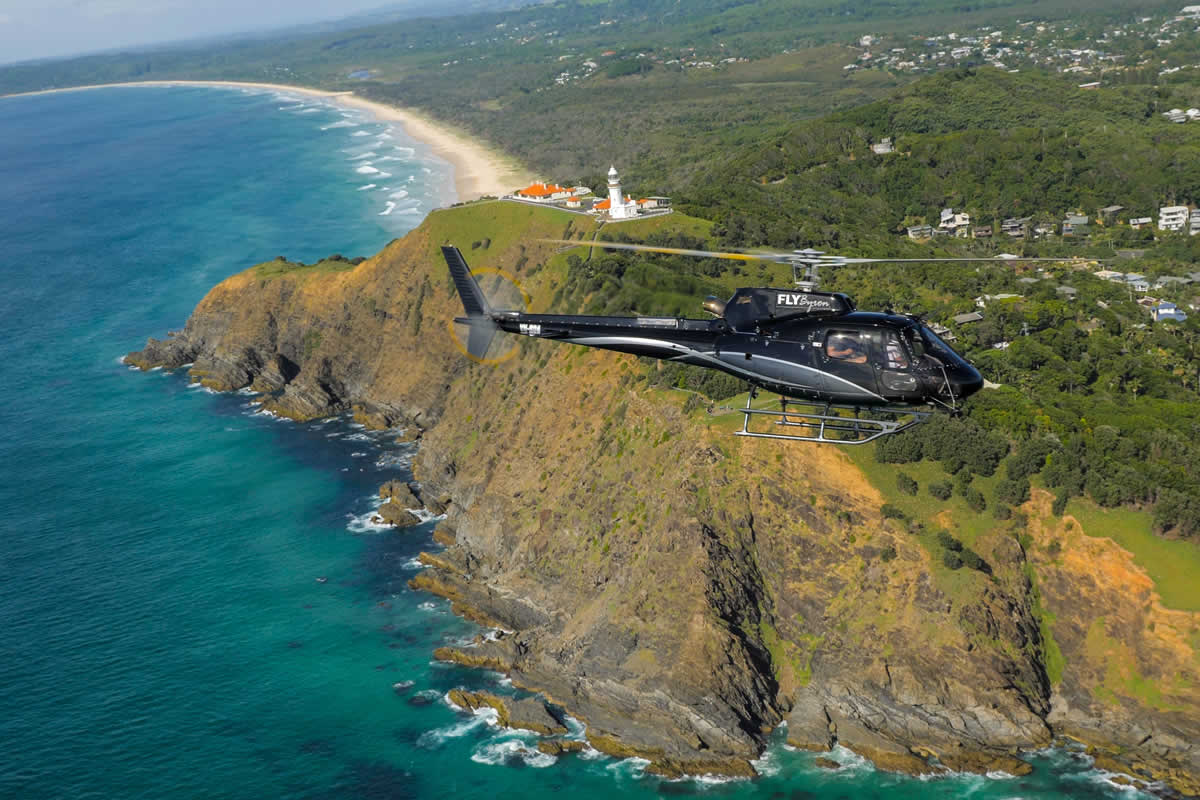 Helicopter flying over Byron bay